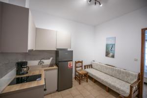 Kuchyň nebo kuchyňský kout v ubytování Lilian Beachfront Apartments