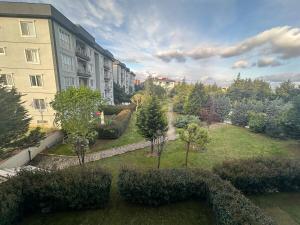 an aerial view of a garden in front of a building at Balcony , Pool, In Nature in Istanbul