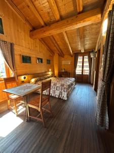 Posezení v ubytování HIBOU Chambres - Cogne