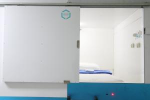 Fotografie z fotogalerie ubytování TAMU CAPSULE HOTEL v destinaci Kejayan