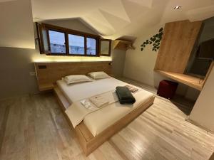 Postel nebo postele na pokoji v ubytování Social House MIL