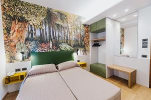 Postel nebo postele na pokoji v ubytování Hotel La Serena