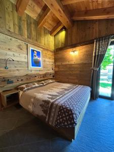 Postel nebo postele na pokoji v ubytování HIBOU Chambres - Cogne