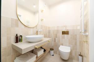 Koupelna v ubytování Hetman Main Square Apartments