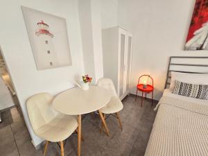 A bed or beds in a room at Oneiropagida
