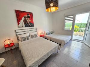 A bed or beds in a room at Oneiropagida