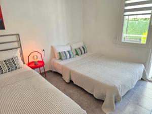 A bed or beds in a room at Oneiropagida