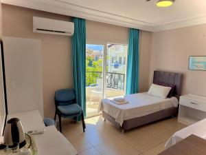 Postel nebo postele na pokoji v ubytování Fidan Apart Hotel + 37 fotografií