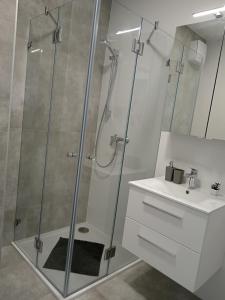 Koupelna v ubytování Villapark Apartmanok A-B 3, 4,