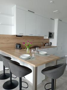 Kuchyň nebo kuchyňský kout v ubytování Villapark Apartmanok A-B 3, 4,