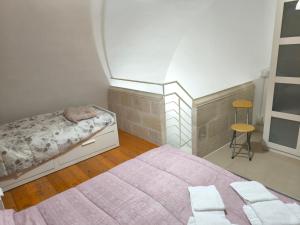 Postel nebo postele na pokoji v ubytování La Rosa dei Sassi