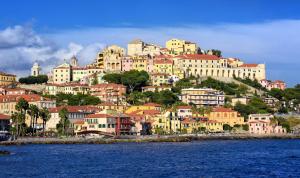 a town on top of a hill with houses at La Casetta di Alex in Ventimiglia