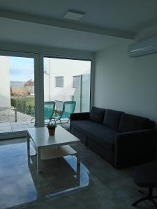 Posezení v ubytování Villapark Apartmanok A-B 3, 4, + 18 fotografií