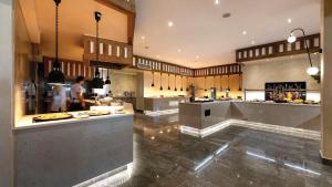 Kuchyň nebo kuchyňský kout v ubytování Corfu Acharavi Hotel