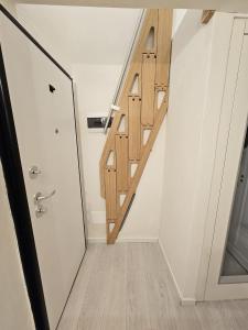 a staircase in a room with white walls at Florence Colonna Spa in Florence +21 photos