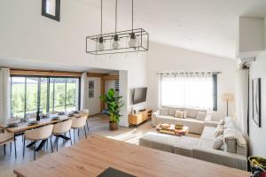 Χώρος καθιστικού στο Domaine la bergerie st cyprien Internet 4 chambres