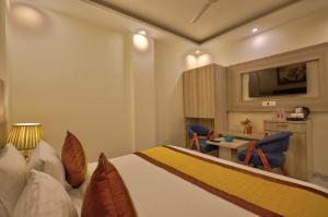 Postel nebo postele na pokoji v ubytování Hotel SOHO 62