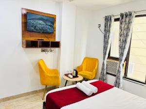 Postel nebo postele na pokoji v ubytování Hotel SOHO 62