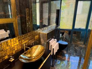 Kúpeľňa v ubytovaní Golden Apartments Centrum