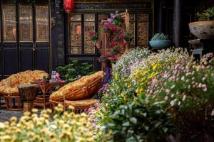 Zahrada ubytování Yiyuan Snow Mountain View Naxi Style Inn- Lijiang Old Town Mufu branch