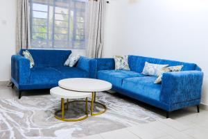 Χώρος καθιστικού στο Haven Suites Bnb - Runogone