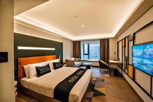 Tempat tidur dalam kamar di Mustel