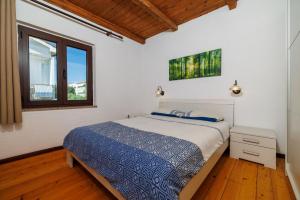 Postel nebo postele na pokoji v ubytování Apartment Dani + 75 fotografií