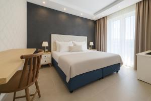 Postel nebo postele na pokoji v ubytování Hotel Casa di Sofia