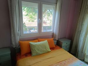 Postel nebo postele na pokoji v ubytování Dimis apartments