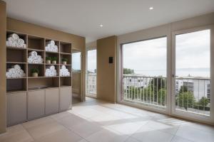 A kitchen or kitchenette at b-smart hotel Arbon