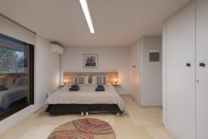 A bed or beds in a room at Studio Krinon - Paleo Psychiko