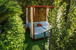 Jardin de l'établissement Hôtel Le Canberra