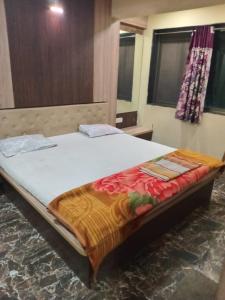 Voodi või voodid majutusasutuse Hotel Golden toas