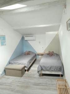 Ένα ή περισσότερα κρεβάτια σε δωμάτιο στο Gîte 4 personnes Gorges de l'Ardèche