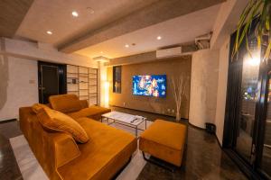 TV a/nebo společenská místnost v ubytování Zen House Umeda