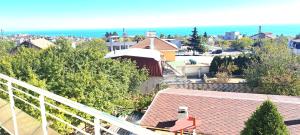 arial view of a city with buildings and the ocean at Къща за гости ,,Лозница ГТ'' in Varna City