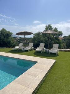The swimming pool at or close to Villa Nefeli