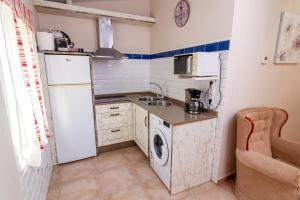 Küche/Küchenzeile in der Unterkunft Apartamentos Rurales Tía María