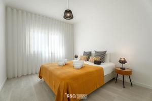 Katil atau katil-katil dalam bilik di Memory house - stunning sea view