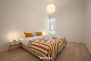 Katil atau katil-katil dalam bilik di Memory house - stunning sea view