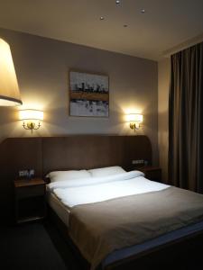 Primavera Hotel客房内的一张或多张床位