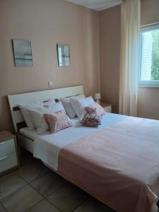 Voodi või voodid majutusasutuse Apartmani Goran Orebić toas