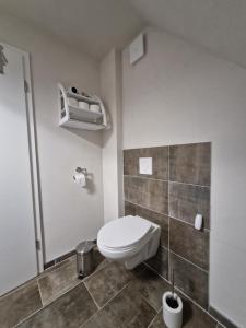 Koupelna v ubytování Ferienhaus Alpakahof Goslar + 21 fotografií