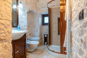 Ένα μπάνιο στο I Trulli di Dona Filomena