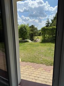 Taman di luar Dom z widokiem na Wisłę, ogrodem i parkingiem AC Progres