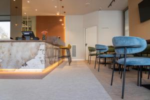 TV a/nebo společenská místnost v ubytování BISCARDI Hotel
