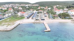 an aerial view of a beach with a resort at Rock Mobile Home in Sveti Petar