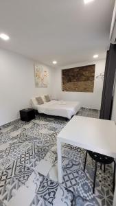 Posezení v ubytování AYZ Silvela - Auto check-in property
