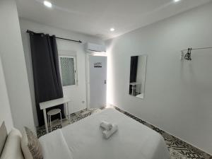 Postel nebo postele na pokoji v ubytování AYZ Silvela - Auto check-in property