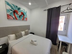 Postel nebo postele na pokoji v ubytování AYZ Silvela - Auto check-in property